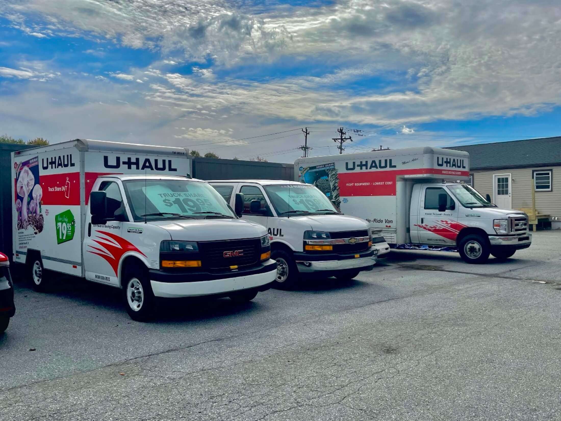 U-Haul trucks and van parked at Crazy Ray's